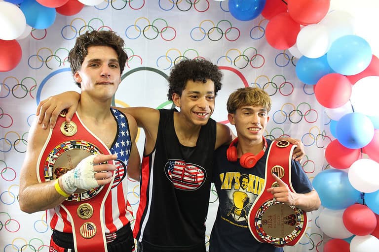 Team Frankie Boxing's Thomas Vetter (left), Joshua Aqueron (middle) and Francesco Alagna (right) pose for pictures on Sunday. [Photos by Austyn Szempruch]