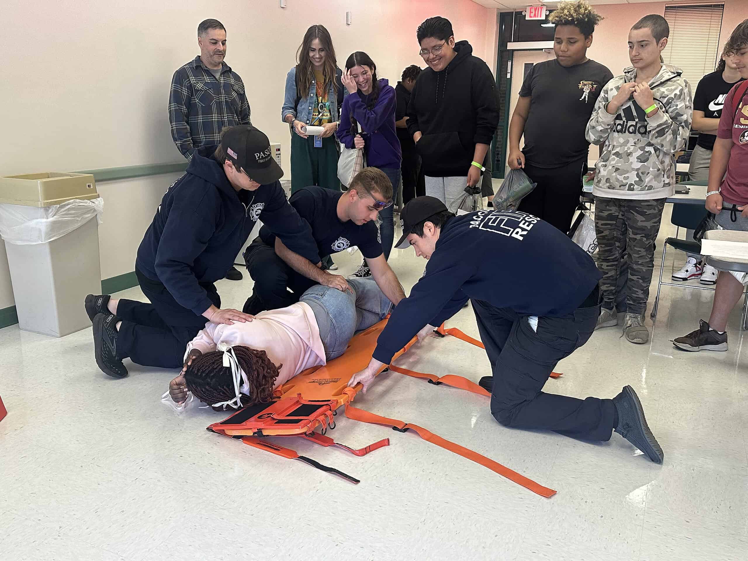 PHSC EMT students demonstrating what they're learning. [Photo by Summer Hampton]