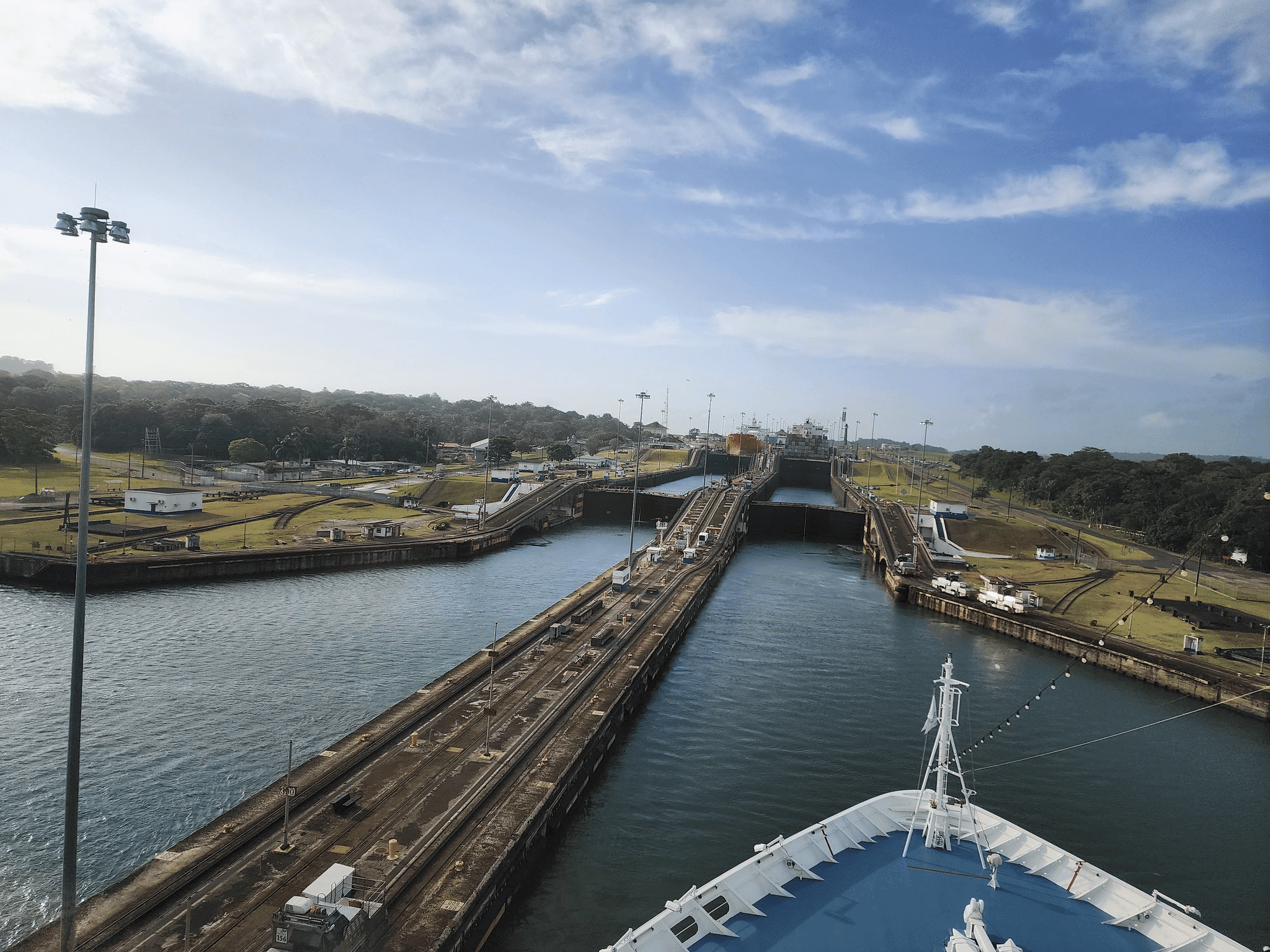 The couple thought the canal looks so narrow as they viewed the approach from the bow of their ship.