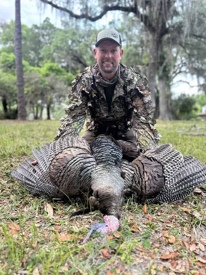 Arkansas’s TJ Hayes and an ancient swamp gobbler taken near Silver Lake.