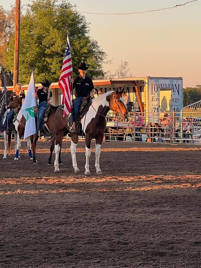Ag Ambassadors flag presentation during the PCA Rodeo. [Courtesy of FAWE]