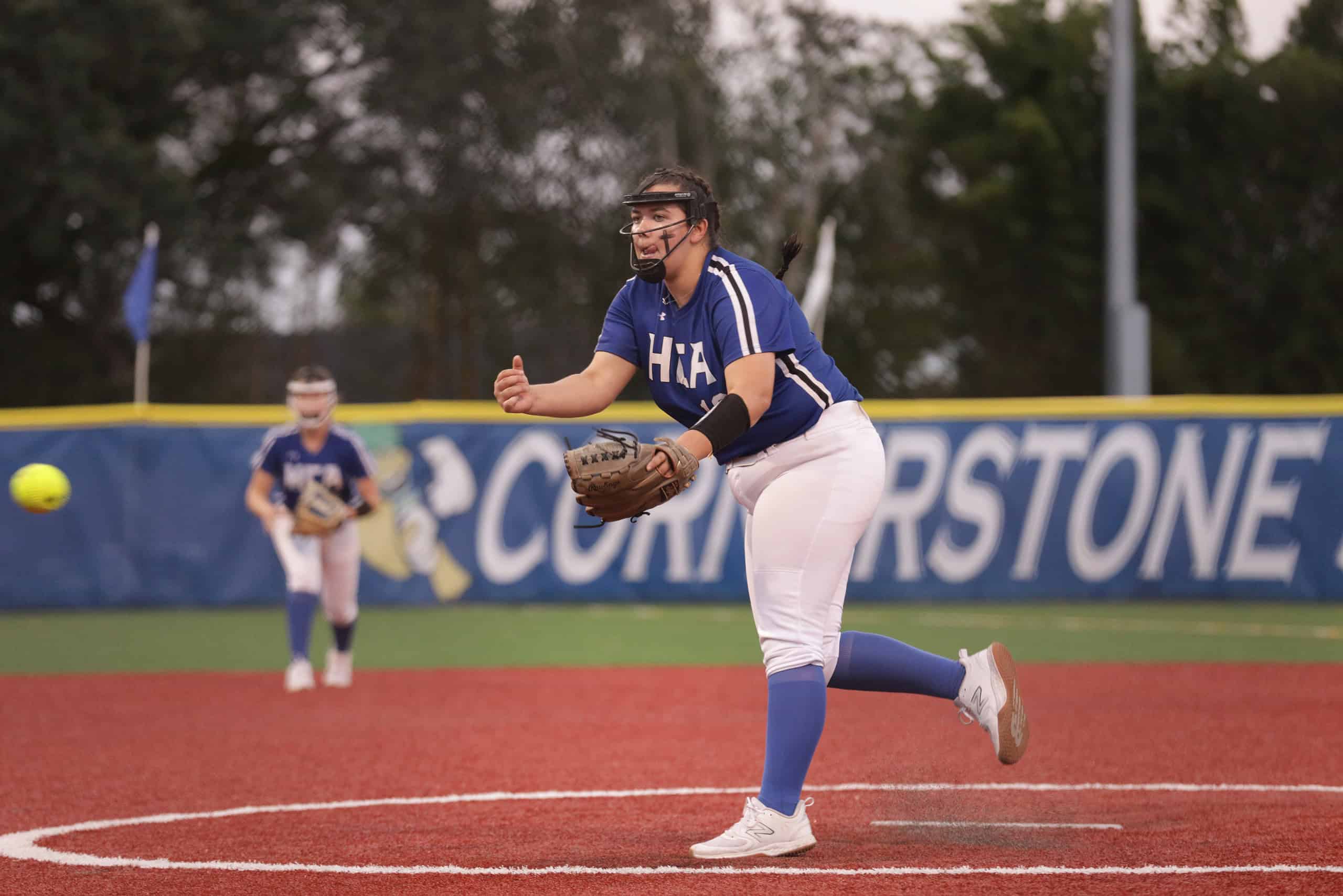 HCA Pitcher Kaylana Lyons delivers a pitch from the mound during Wednesday's Regional Quarterfinal. [Photo Provided by Sean Gill]