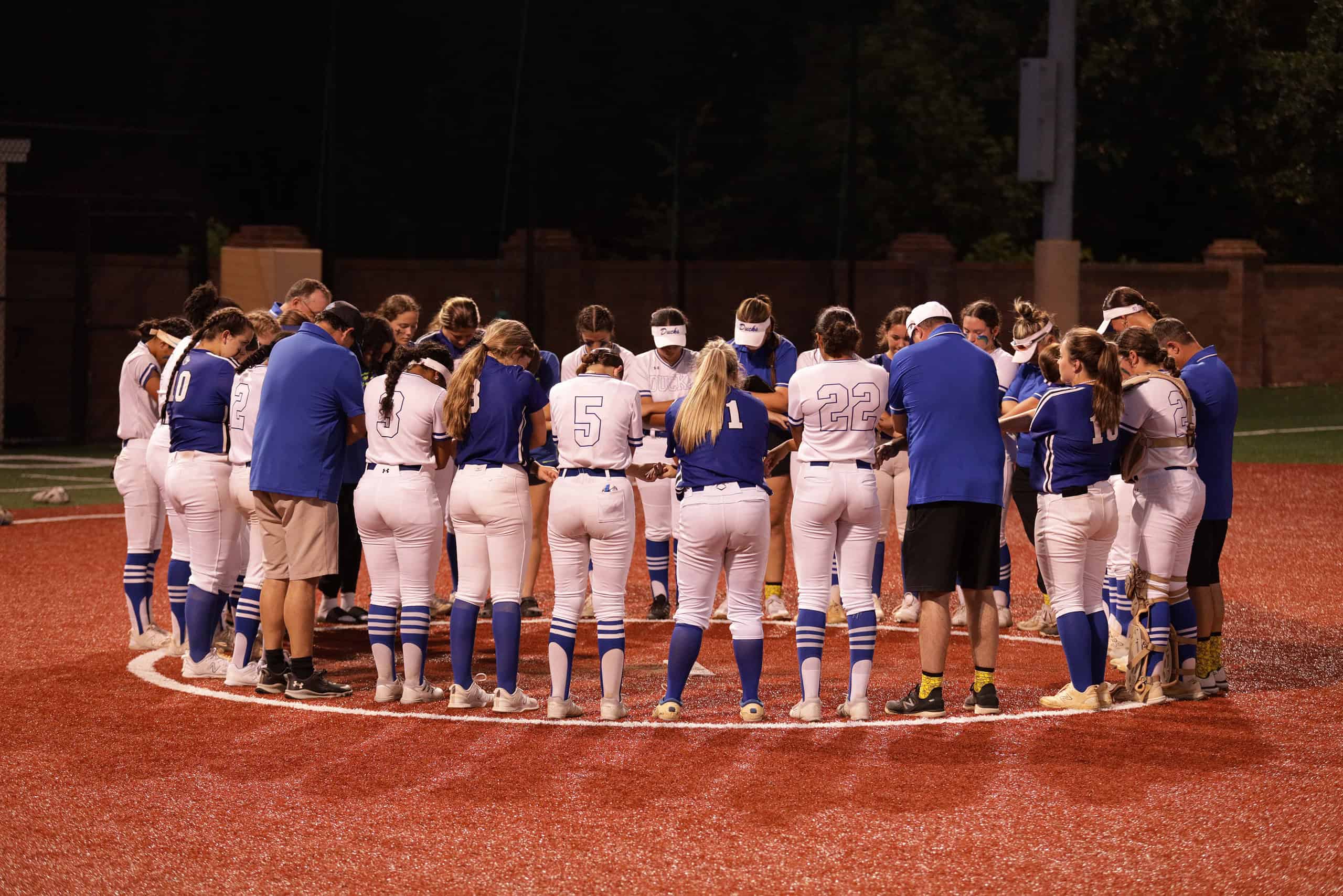 HCA and CCA players and coaches' prayer after the game. [Photo Provided by Sean Gill]