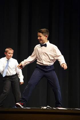 Ashton Ledger (front) and Samuel Mullings (back) in "Singing in the Rain"