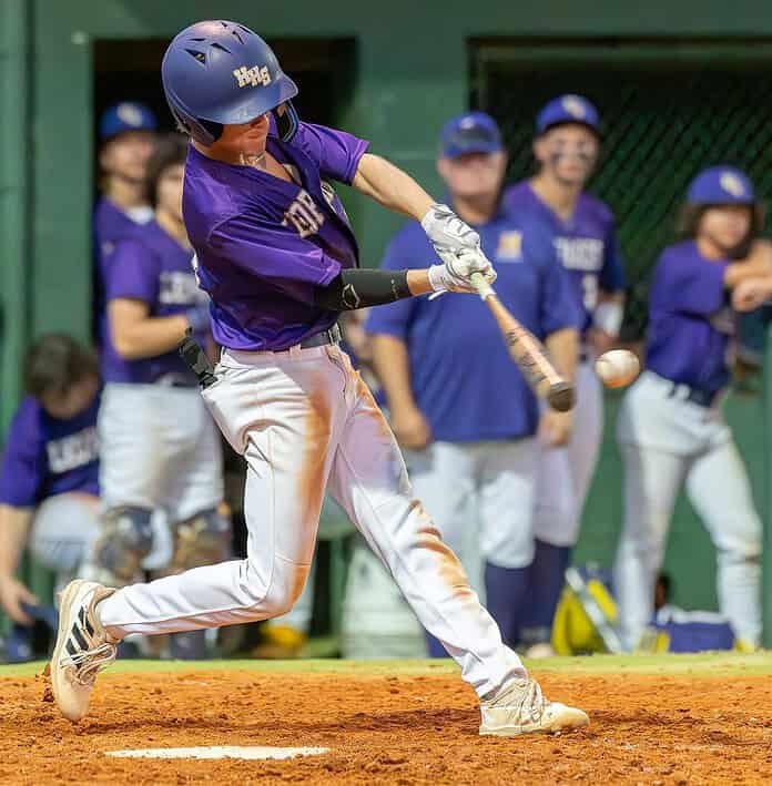 Hernando High’s Braden Harmon lines a base hit in the game with the Hudson Cobras Wednesday in Brooksville in the 4A District 6 semifinal game. [Photo by Joseph DiCristofalo]