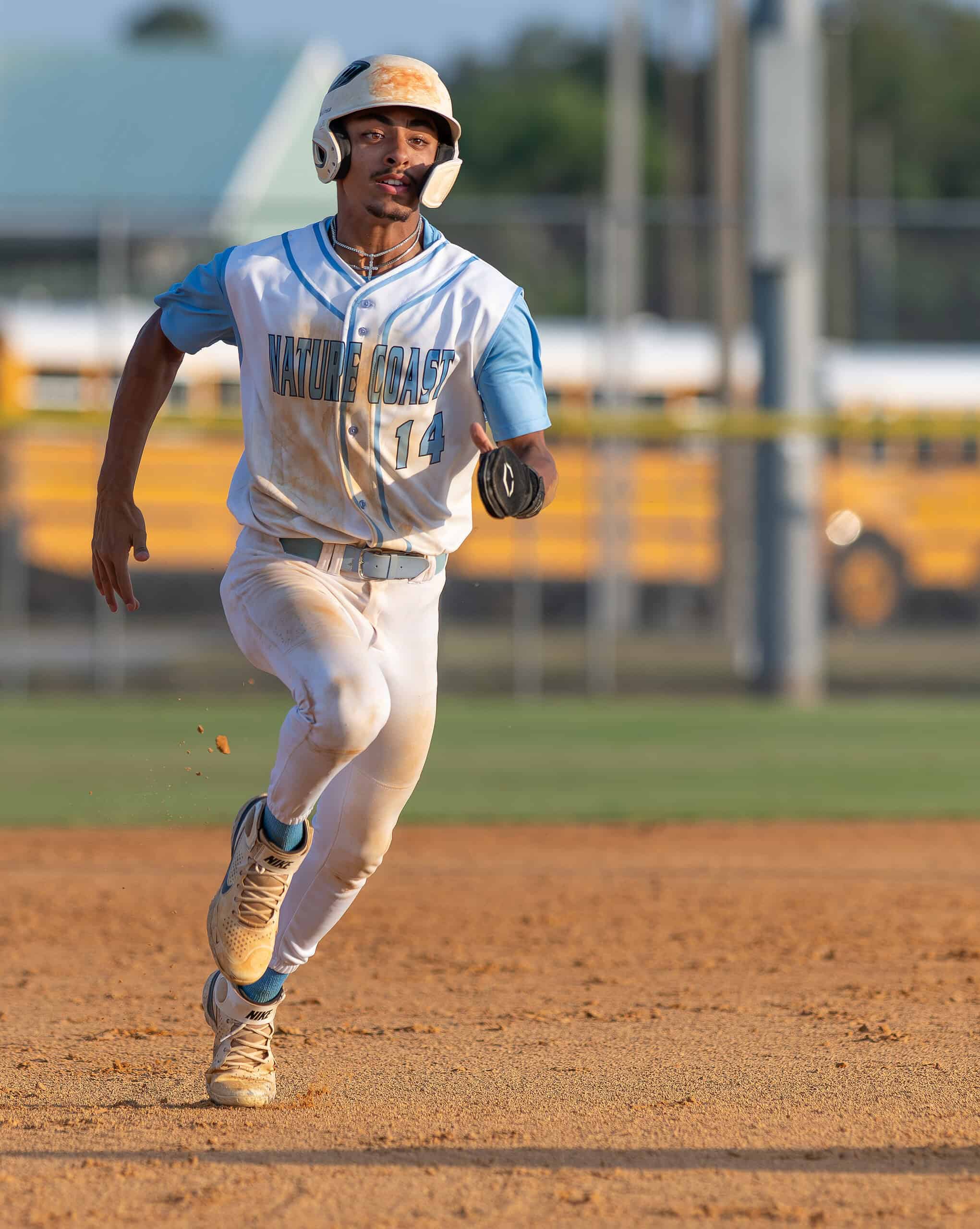 Nature Coast Tech, 14, Nate Leavitt heads to third base in the 4A Regional Quarterfinal game versus visiting Satellite High. Leavitt scored the first run of the game. Photo by [Joseph Dicristofalo]
