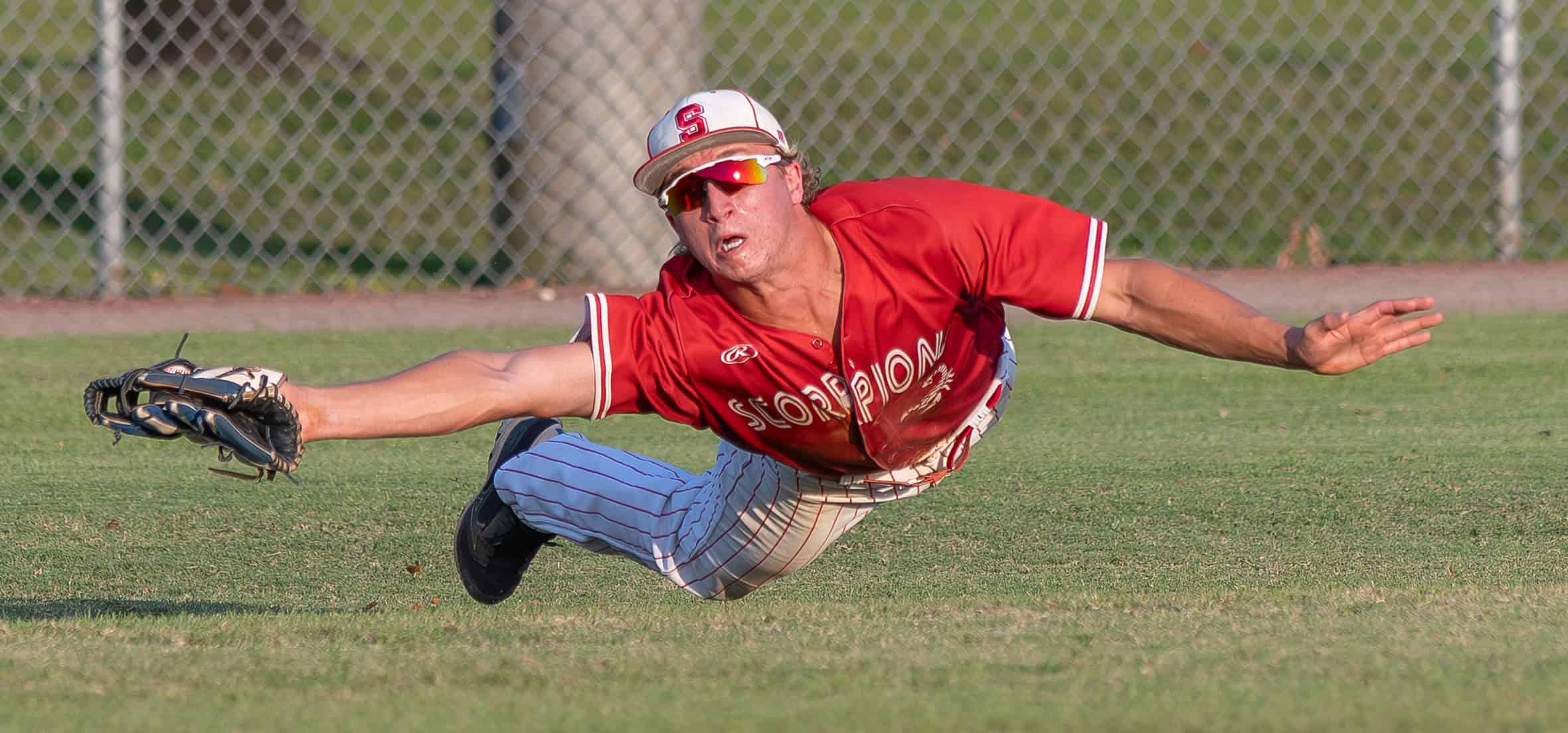 Satellite High’s left fielder made a diving catch on a fly ball off the bat of Nature Coast’s Dylan Palmer in the 4A Regional Quarterfinal game. Photo by [Joseph Dicristofalo]
