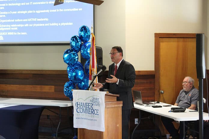Tampa General Hospital President and CEO John Couris speaks to Chamber members during April's membership meeting. [Photo by Austyn Szempruch]
