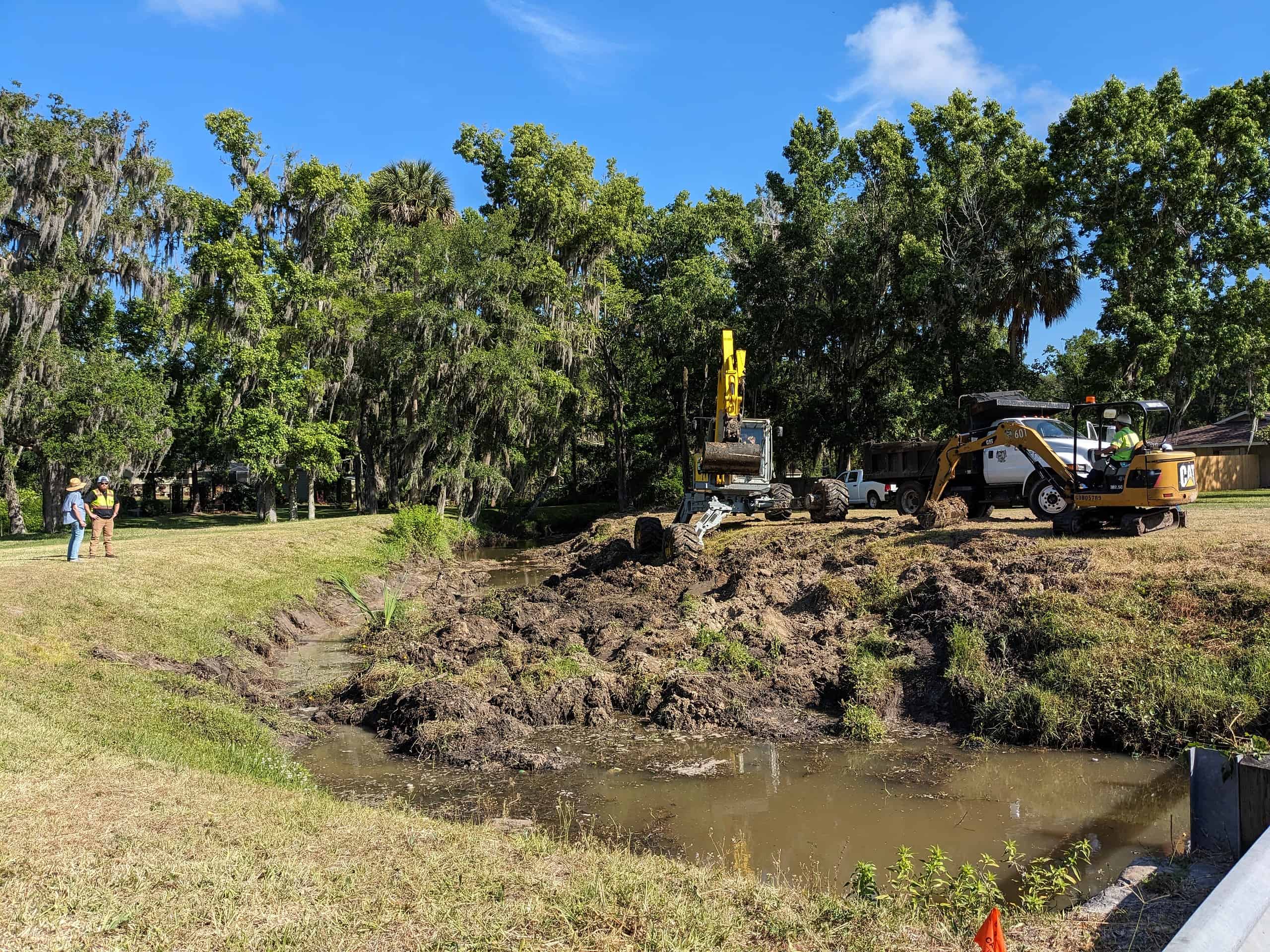 Dredging underway at Candlelight for stormwater mitigation. [Photo by Lisa MacNeil]