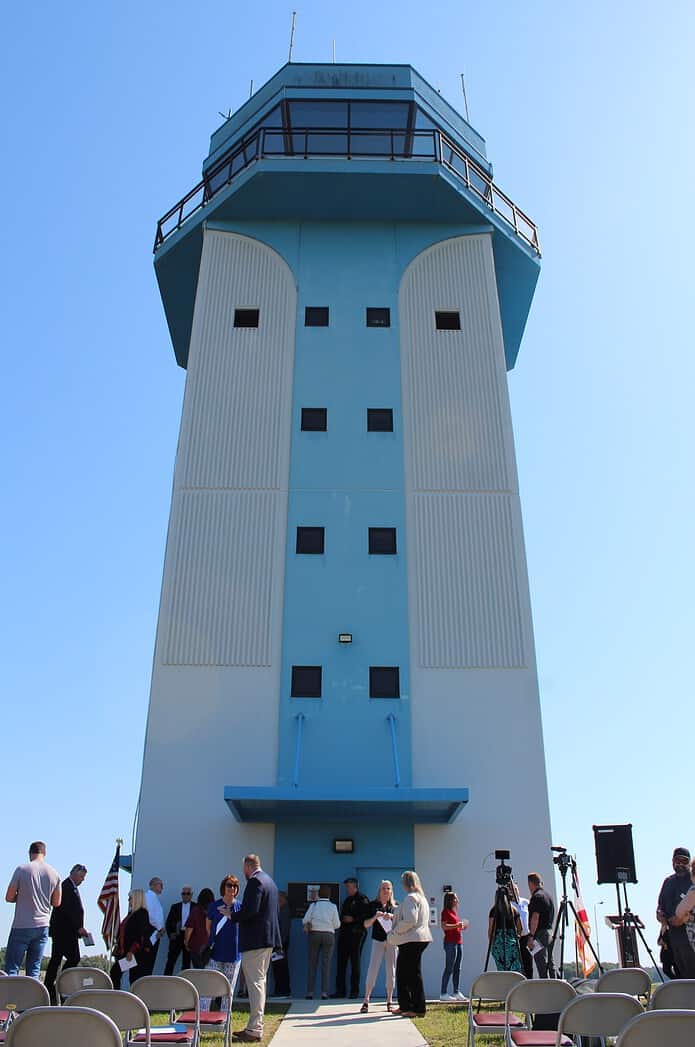 Attendees mingle after Thursday's dedication of the Air Traffic Control Tower to Gary Schraut. [Photo by Austyn Szempruch]