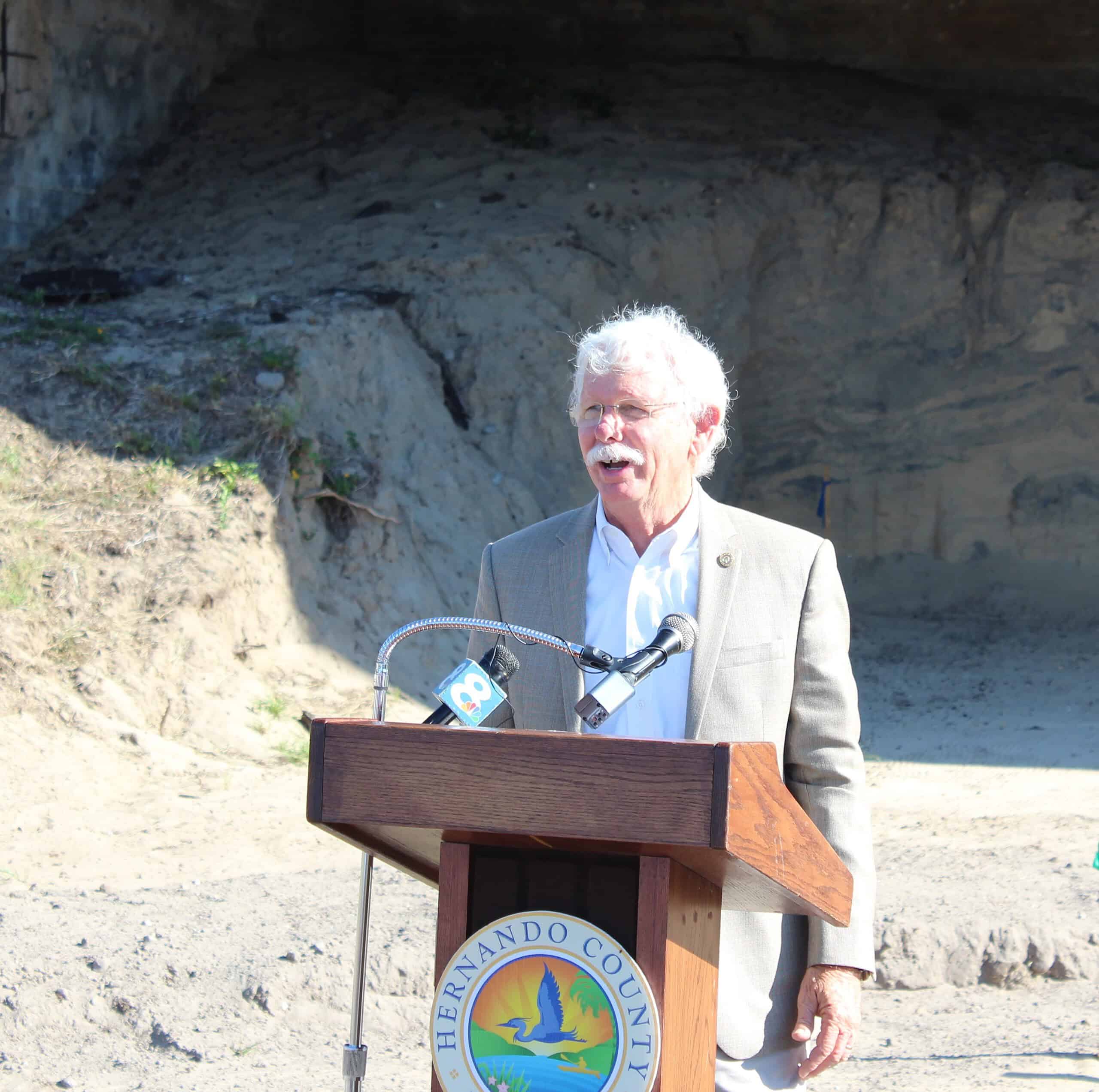 Local architect and pilot Ed Hoffman speaks at the groundbreaking ceremony of the World War II memorial on Thursday. [Photo by Austyn Szempruch]