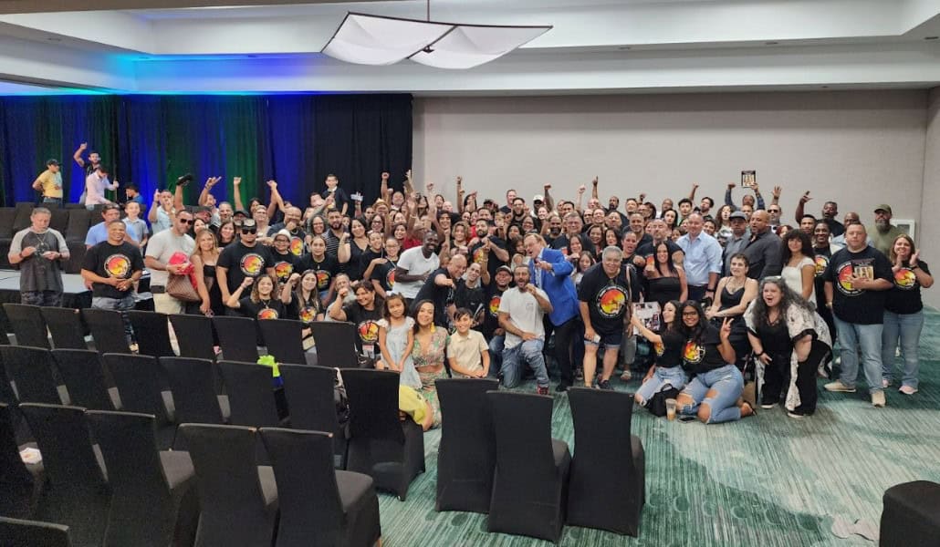 Chelo Jose Alonzo celebrates with a huge group of family and friends at the Marriott where the induction ceremony took place on Sunday. [Photo by Austyn Szempruch]