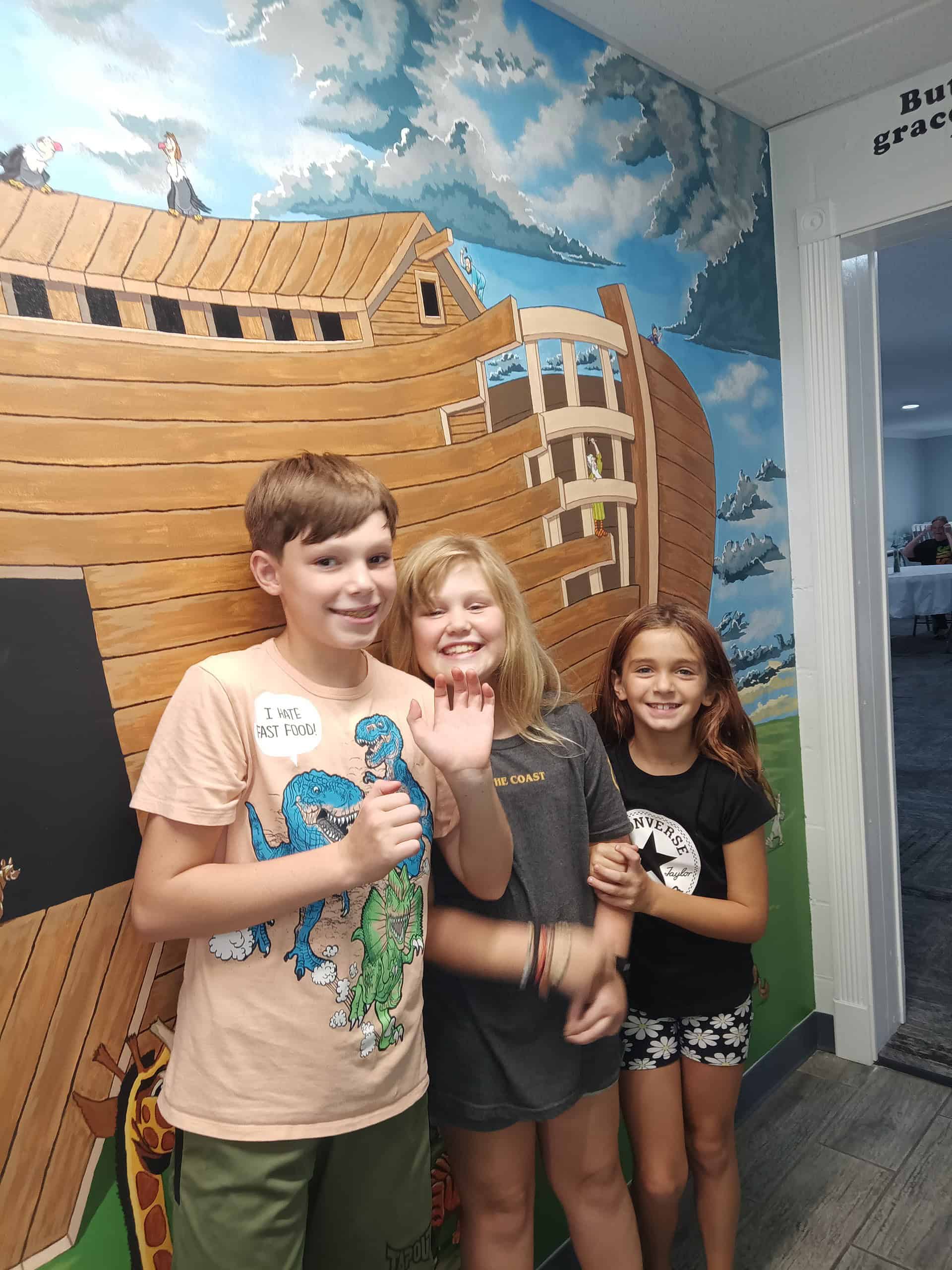 Children pose in front of Noah's Ark mural [Credit: G. Valentin]
