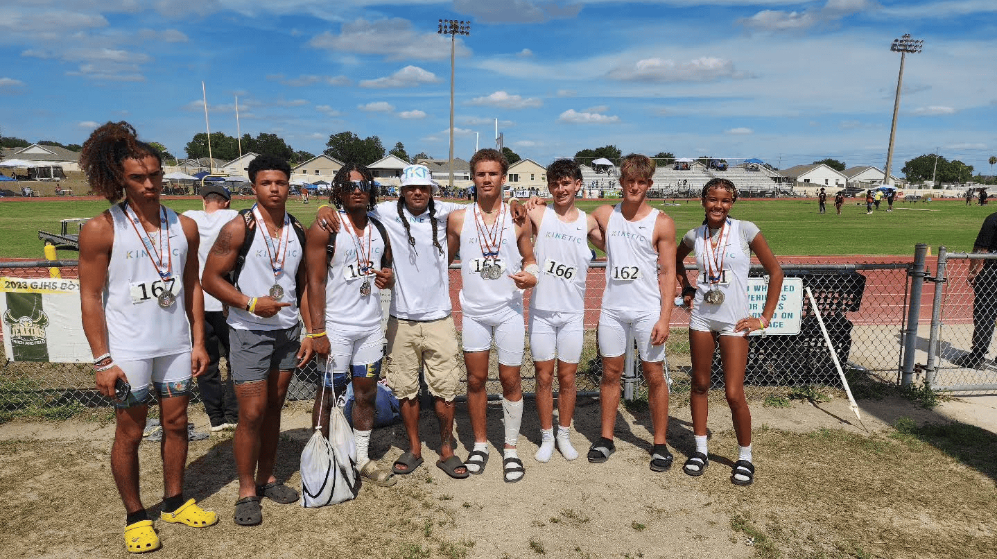 (From left to right) Xylus Pastrana, Connor Mccazzio, Chadiell Echavarria, Coach Thomas Watson, Jaxson Nichols, Kason O'Neil, Brayden Barrett, and Deaijah Tullis at a competition on Lakeland. [Photo credit: Gina Espina]