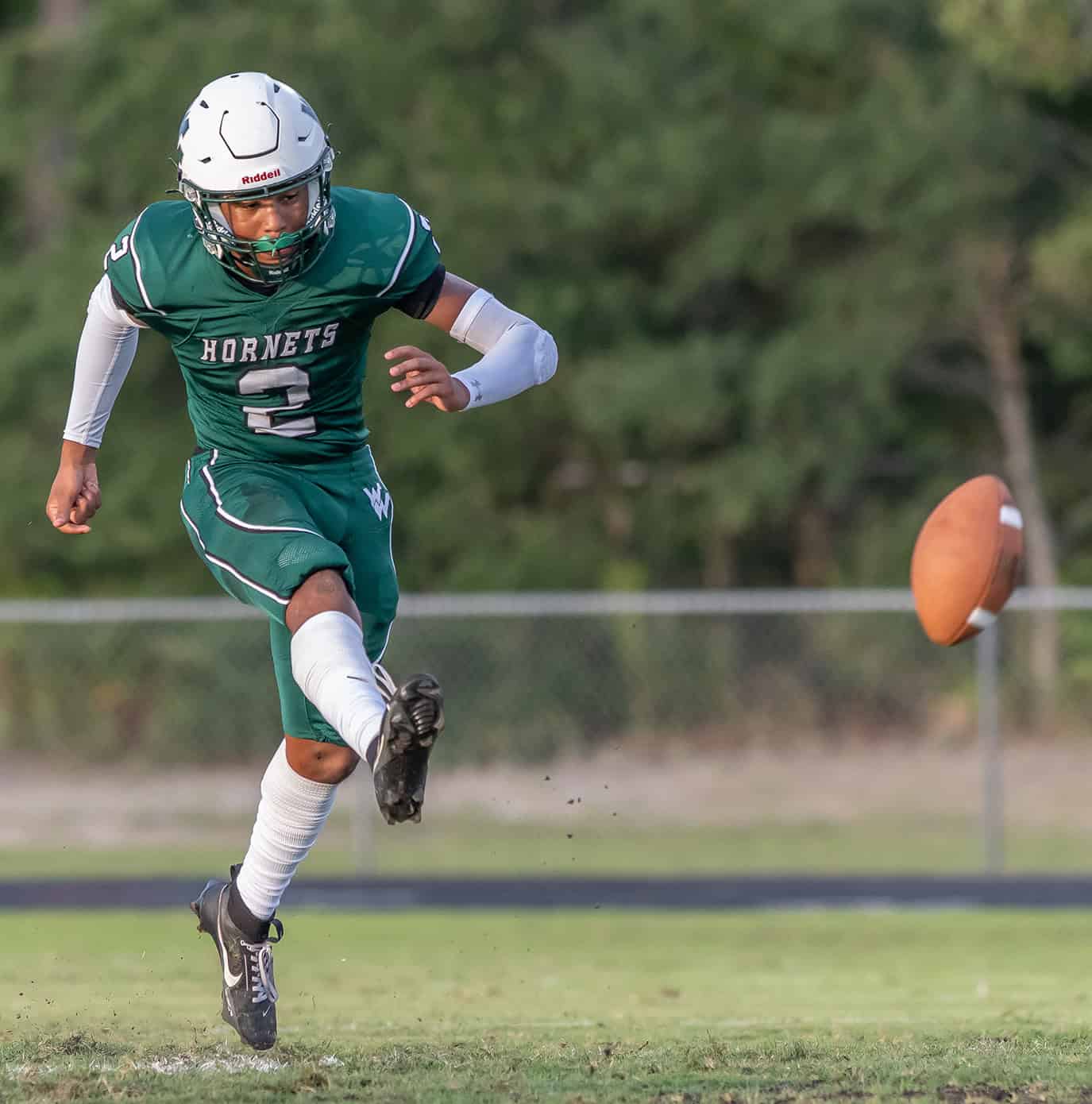 Weeki Wachee High's Alex Wilson gets the 2024 season started kicking off to visiting Sunlake. [Photo by JOE DiCRISTOFALO]