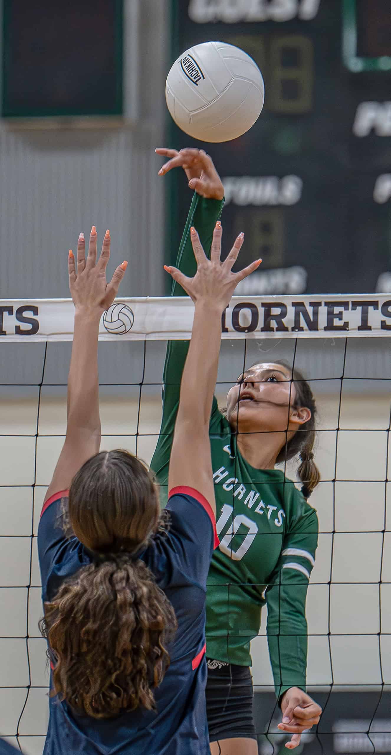 Weeki Wachee High, 10, Jadyn Aponte hits over a Springstead High defender Tuesday at Weeki Wachee High. [Photo by JOE DiCRISTOFALO]