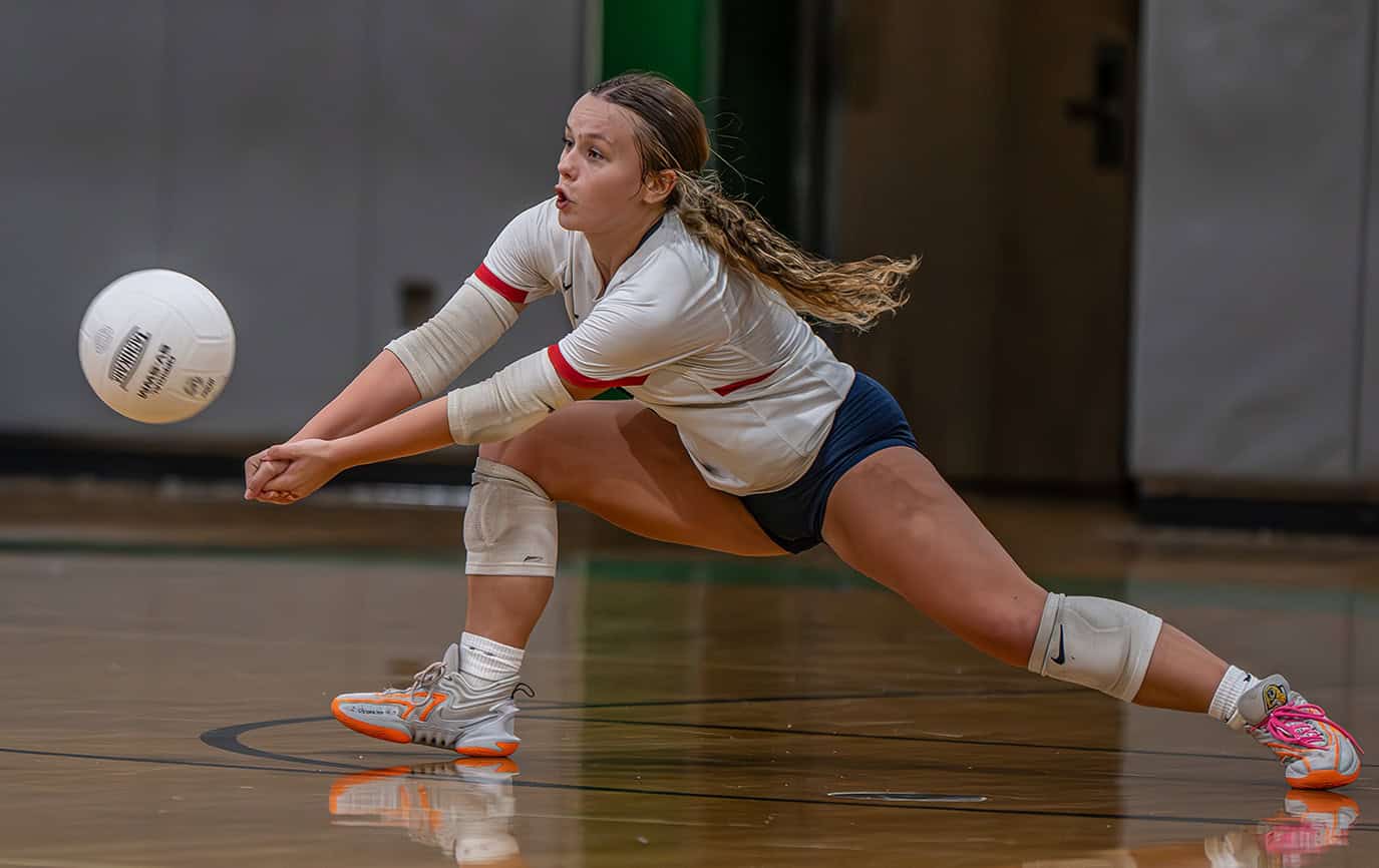 Springstead High, 2, Libero, Kiersten Caamano stretches to dig a serve during the match versus Weeki Wachee High Tuesday.[Photo by Joe DiCristofalo]