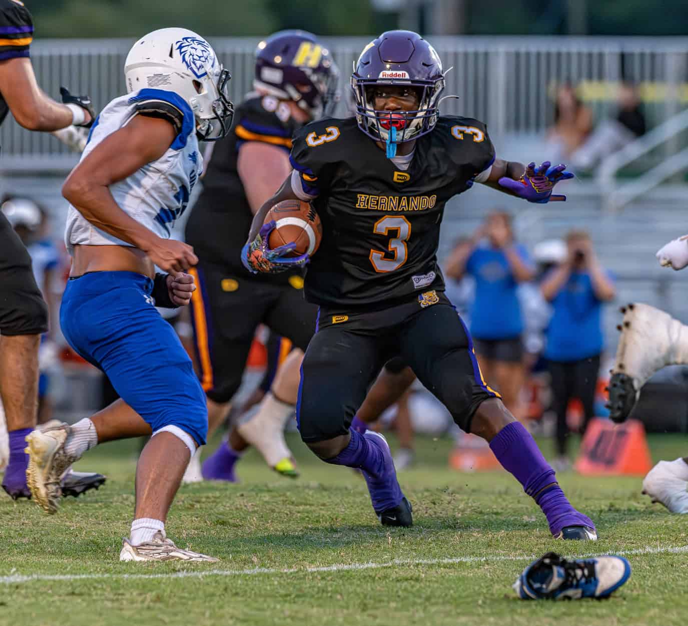 Hernando High running back, 3, Jeremiah Brown sizes up aHollins High School defender Friday in Brooksville. [Photo by Joe DiCristofalo]