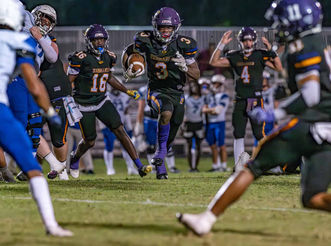 Hernando High running back, 3, Jeremiah Brown surges into an opening for a large gain against visiiting Hollins High School Friday in Brooksville. [Photo by Joe DiCristofalo]