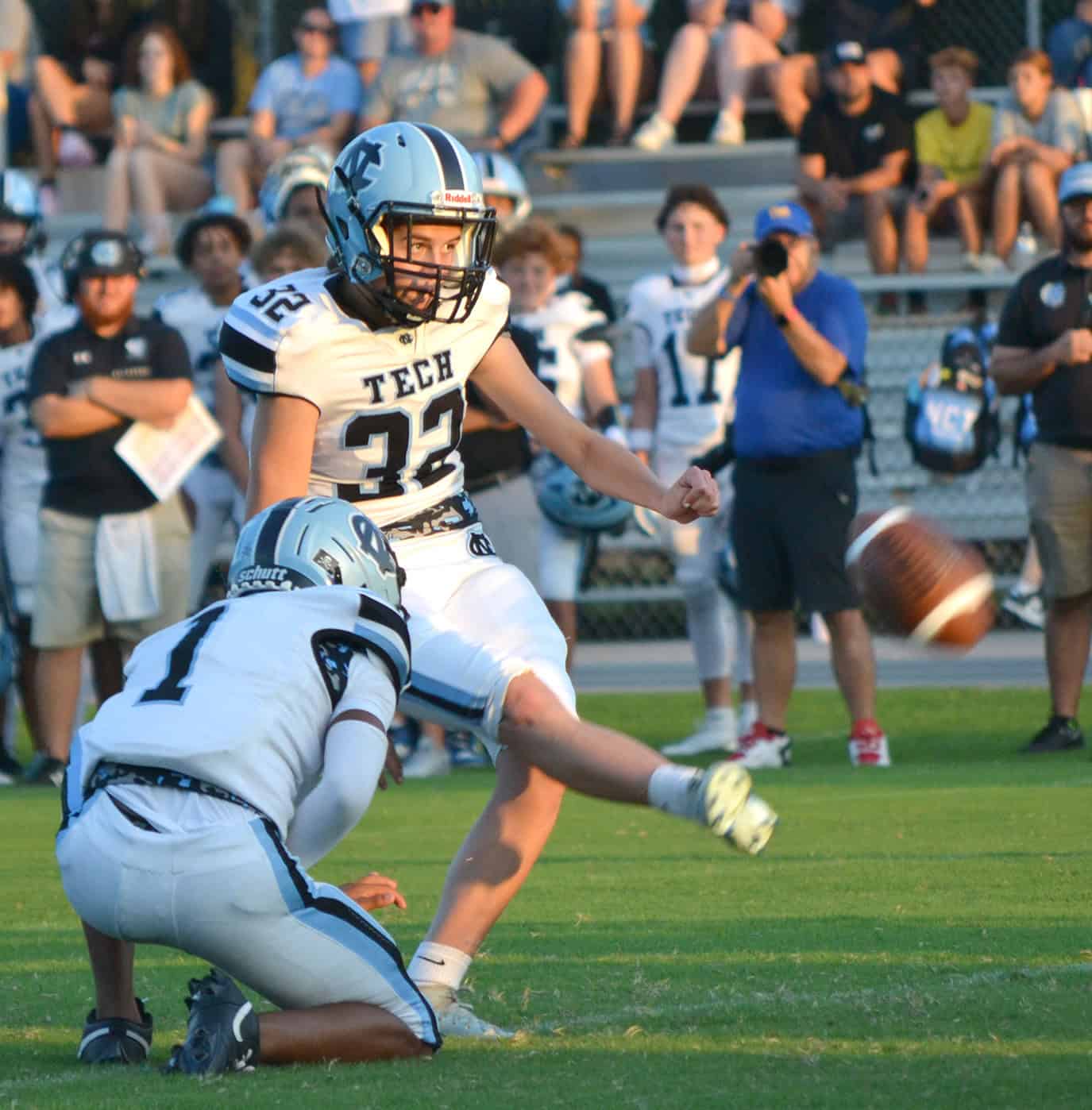 Nature Coast placekicker Peyton Cheze kicks a PAT out of the hold of Aveion Jackson during an Aug. 16 preseason game against Citrus in Inverness. [Chris Bernhardt Jr.]