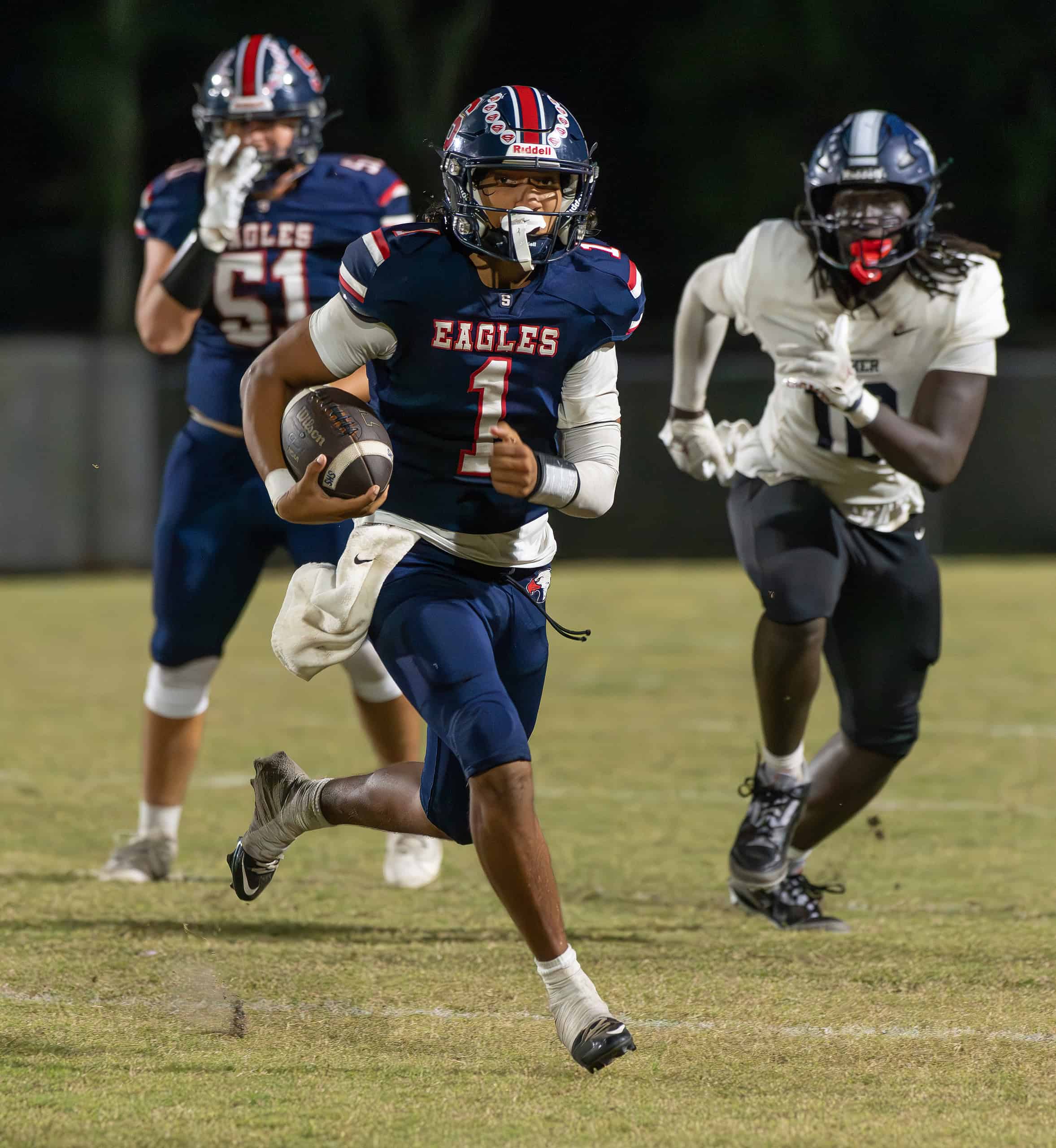 Springstead High, 1, Gio Martinez finds some running yardage in the game versus Gaither High Thursday at Booster Stadium. [Photo by Joe DiCristofalo]