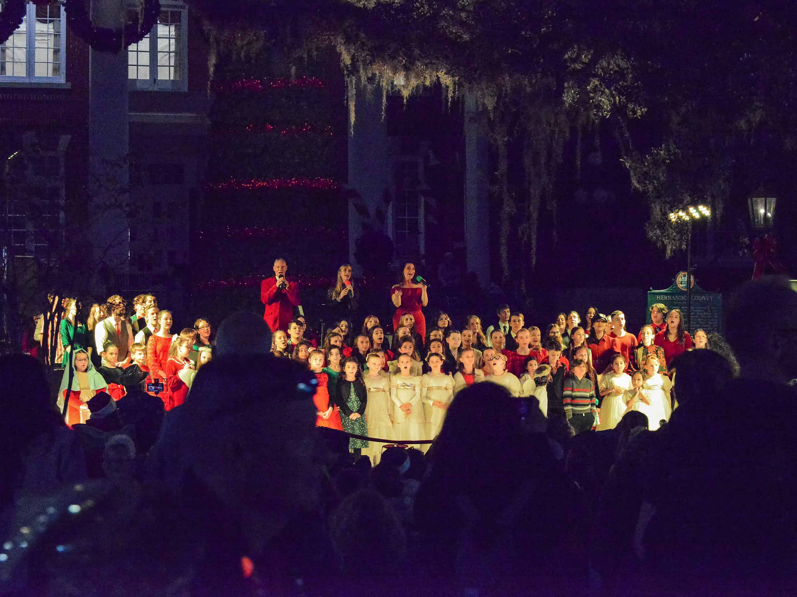 Live Oak Theatre performs for an attentive audience at the Brooksville Tree Lighting on December 5, 2024. [Credit: Jenifer Truitt]