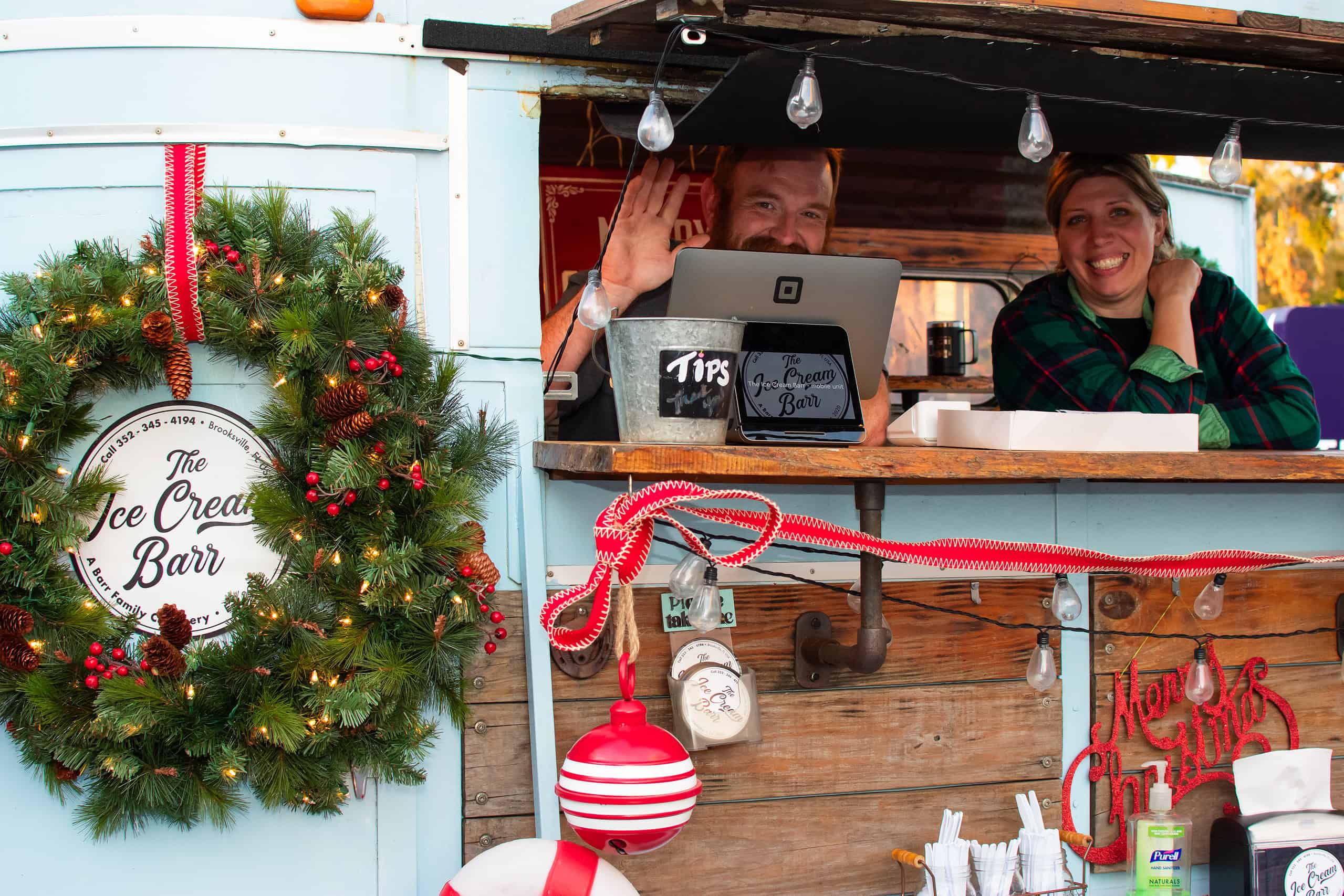 James and Rebekah Barr of The Ice Cream Barr sell their ice cream from their renovated horse trailer at the Brooksville Tree Lighting on December 5, 2024. Their store is located at 500 Broad Street. [Photo by Jenifer Truitt]