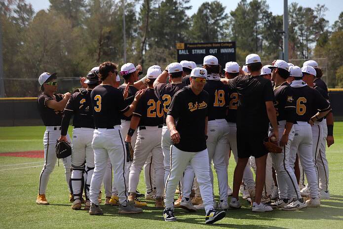 The Pasco Hernando State College baseball team celebrates after a recent win. The Bobcats are ranked #1 in the National Junior College Athletic Association Division II poll for the first time in school history. (Credit: PHSC Athletics Department)