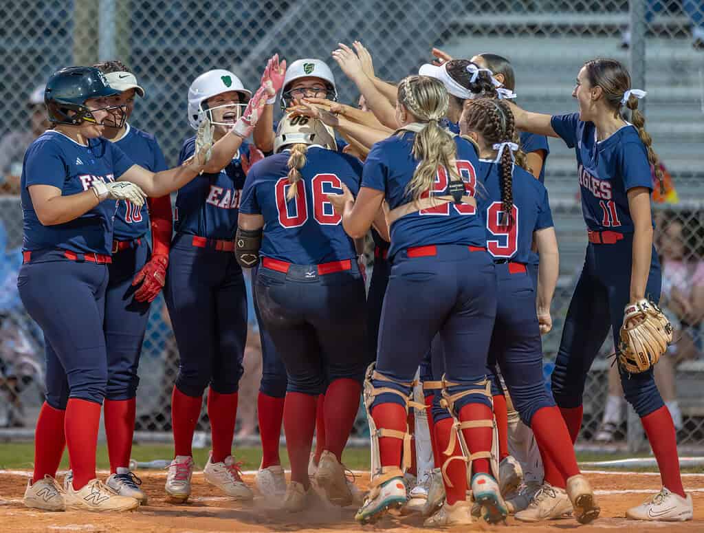 Springstead High, 06, Alivia Miller gets greeted at home plate after her two run homerun Friday versus visiting Nature Coast Tech. [Photo by Joe DiCristofalo]