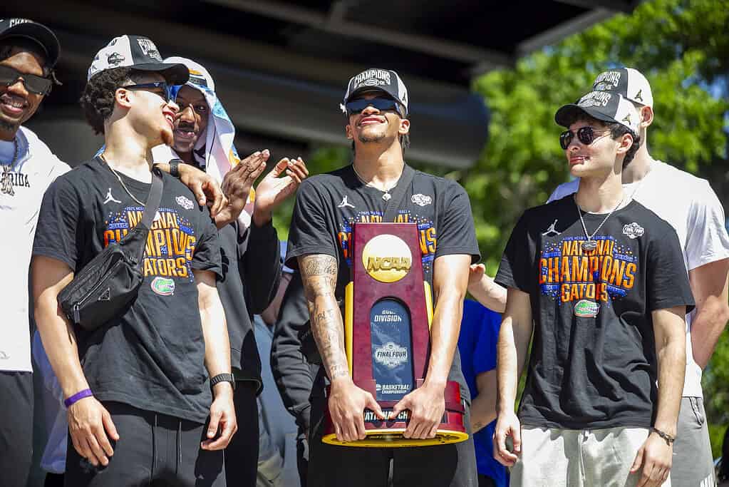 The Gator boys show off trophy at Championship Rally on Flavet Field in Gainesville, Fla., on Tuesday, April 8, 2025. (Photo by Hanna Maglio)