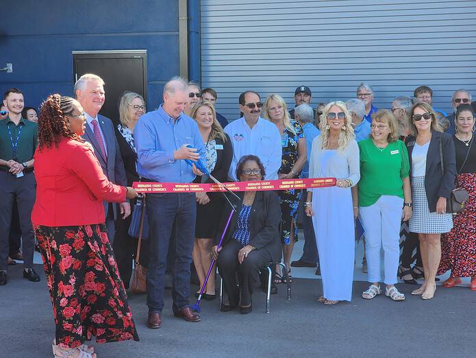 Agricultural Commissioner Wilton Simpson cuts the ribbon at Wilton Simpson Technical College on April 2, 2025. [Credit: Austyn Szempruch]