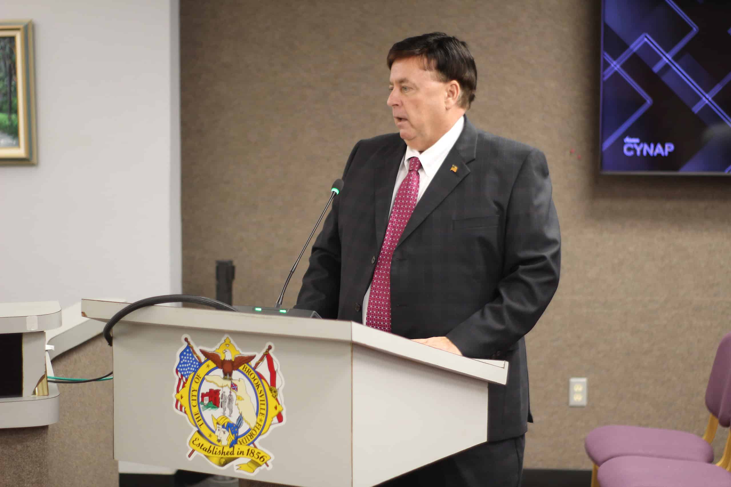 Timothy Day speaks in front of the Brooksville City Council on March 29. [Credit: Axl David]