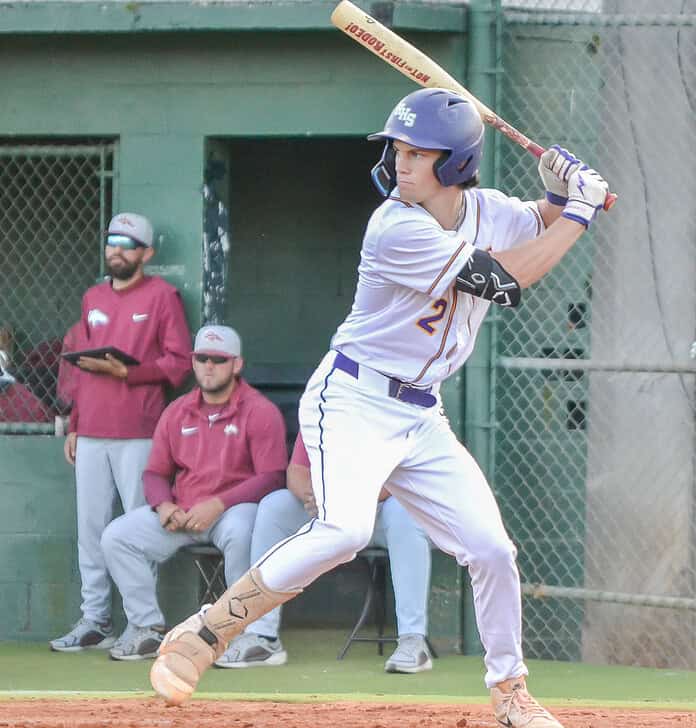 Austin Knierim of Hernando readies to swing at pitch against visiting North Marion on Thursday in Game 3 of the regional quarterfinals. [Credit: Chris Bernhardt Jr.]