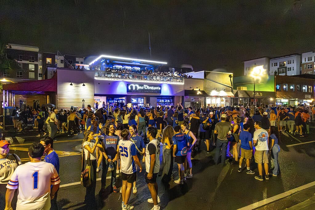 Gator fans gather to celebrate on West University Avenue in Gainesville, Fla., on Monday, April 8, 2025. (Photo by Hanna Maglio)