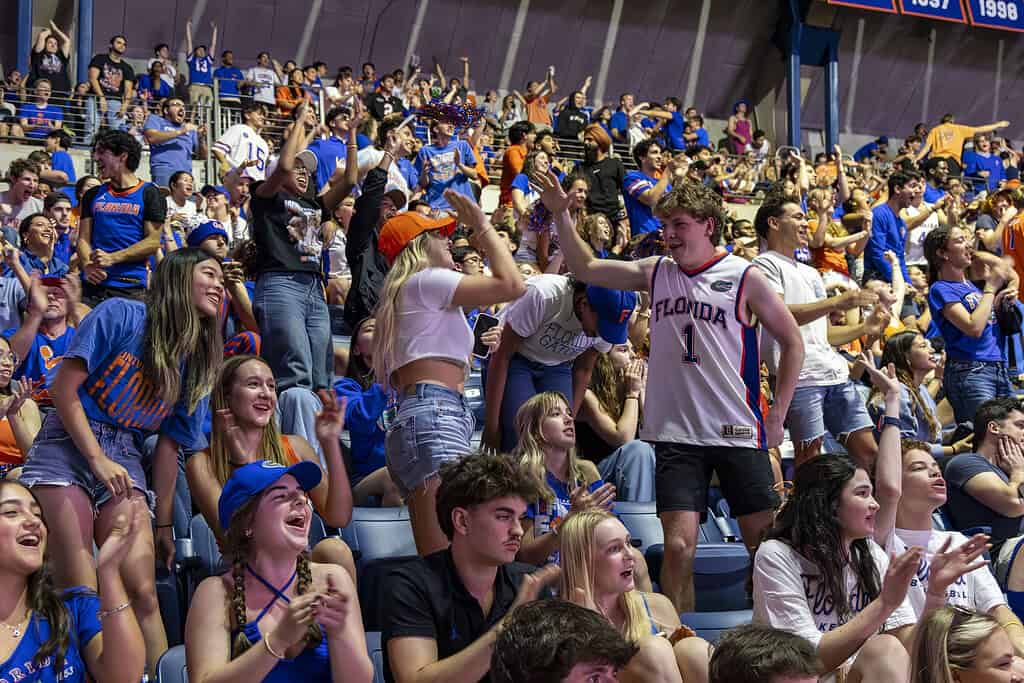 High-fives during the men's basketball NCAA championship at the Stephen C. O'Connell Center in Gainesville, Fla., on Monday, April 8, 2025. (Photo by Hanna Maglio)